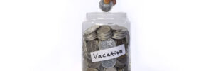 Glass jar of change for vacation savings