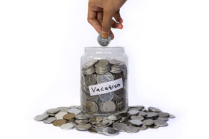 Glass jar of change for vacation savings