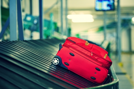 luggage on an airport conveyor belt