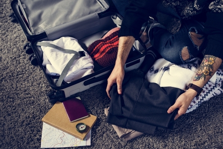 people packing for an international trip