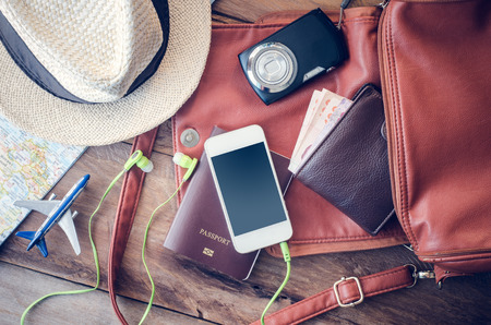 travel accessories and electronics to pack for a trip