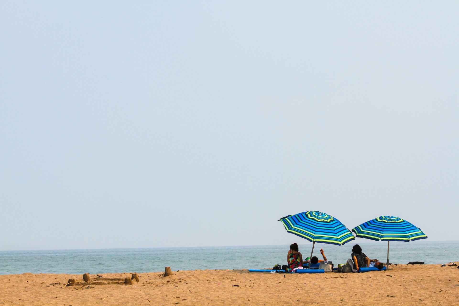 Family Vacationing on a Beach