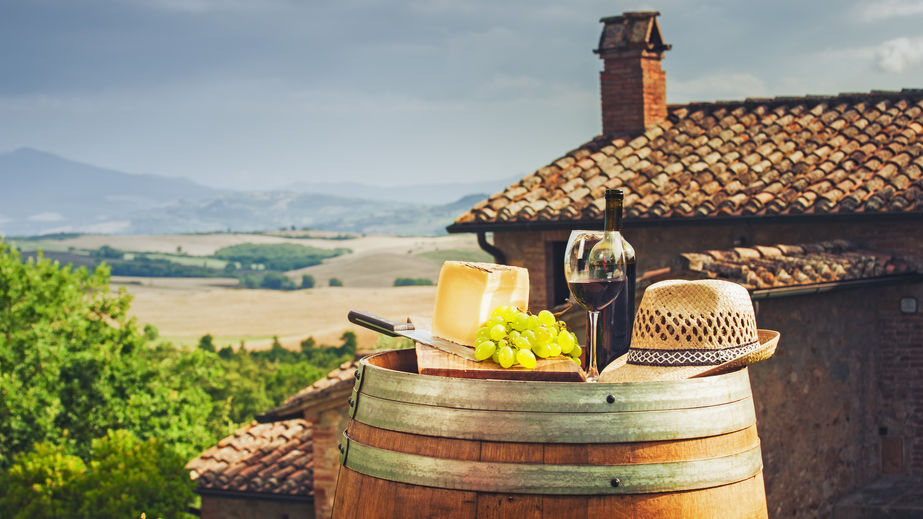 Plate of food overlooking Tuscan scenery