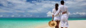 couple on a tropical beach at maldives